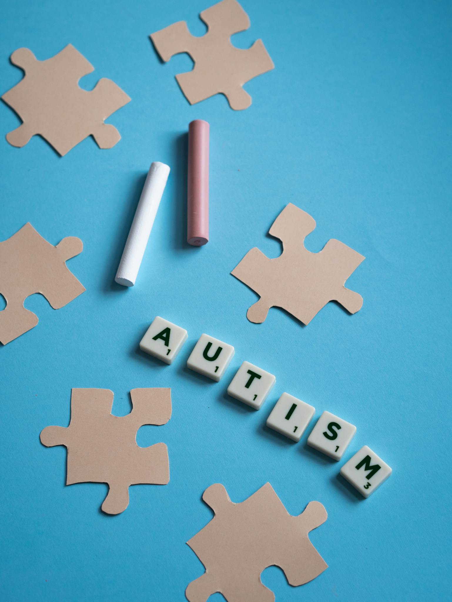 Puzzle Pieces Chalk And Autism Text Symbolize